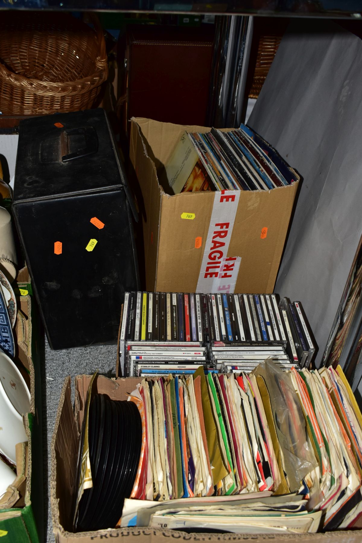 THREE TRAYS AND A CASE CONTAINING OVER TWO HUNDRED AND FIFTY LP'S, 12 INCH, 7 INCH SINGLES AND CD'S,