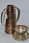 AN EARLY 20TH CENTURY ARTS AND CRAFTS TWIN HANDLED COPPER VASE, of conical form with hand hammered