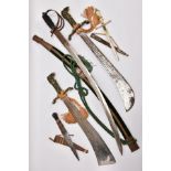FIVE ASSORTED BLADED WEAPONS, two small short swords, curved blades, poorly constructed, knots in