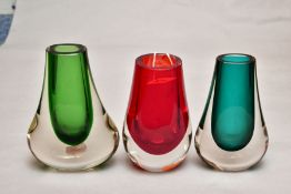 THREE WHITEFRIARS CASED GLASS VASES, comprising two ham bone vases in green, height 14.5cm and