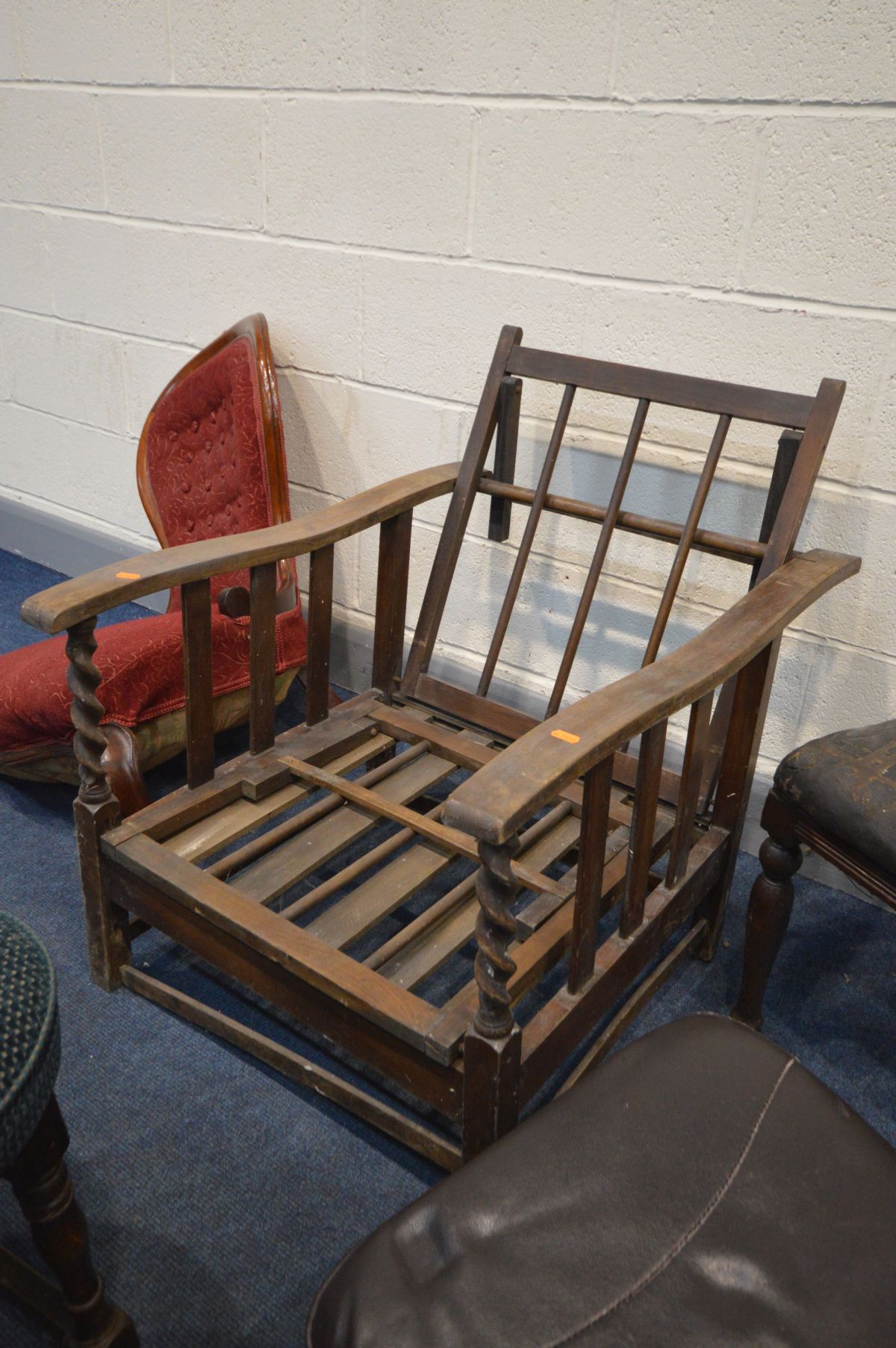 AN ARTS AND CRAFTS OAK RECLINING CHAIR (Sd and loose joints) along with a distressed Victorian spoon - Image 2 of 3