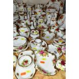 APPROXIMATELY FIFTY PIECES OF ROYAL ALBERT OLD COUNTRY ROSES GIFTWARE, to include vases, (tallest