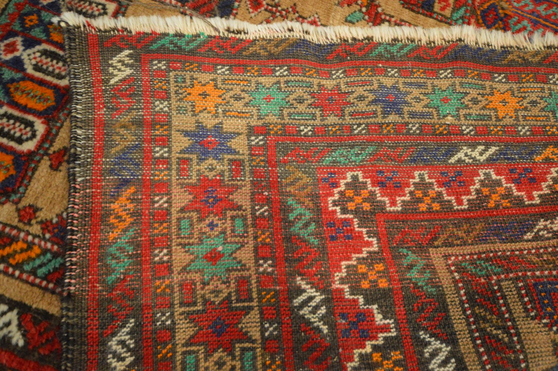 AN INDIAN RUG, russet and red field, and multistap border, 238cm x 128cm - Image 4 of 4