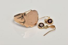 A GENTS 9CT GOLD SIGNET RING AND A PAIR OF YELLOW METAL GARNET DROP EARRINGS, the ring designed with