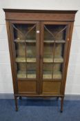 AN EDWARDIAN MAHOGANY AND INLAID TWO DOOR ASTRAGAL GLAZED DISPLAY CABINET, with two shelves, on