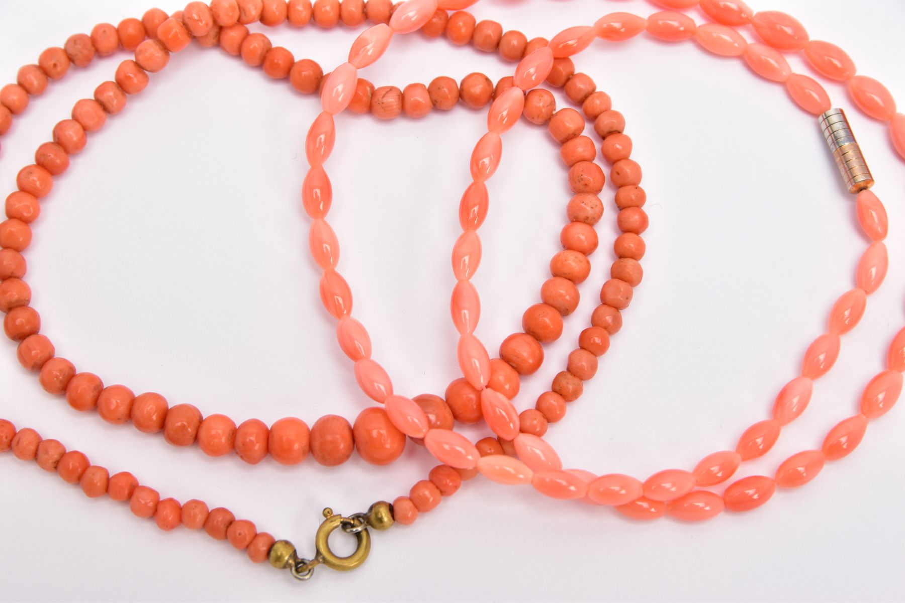 TWO CORAL BEAD NECKLACES, the first a row of graduated spherical coral beads measuring approximately - Image 2 of 2