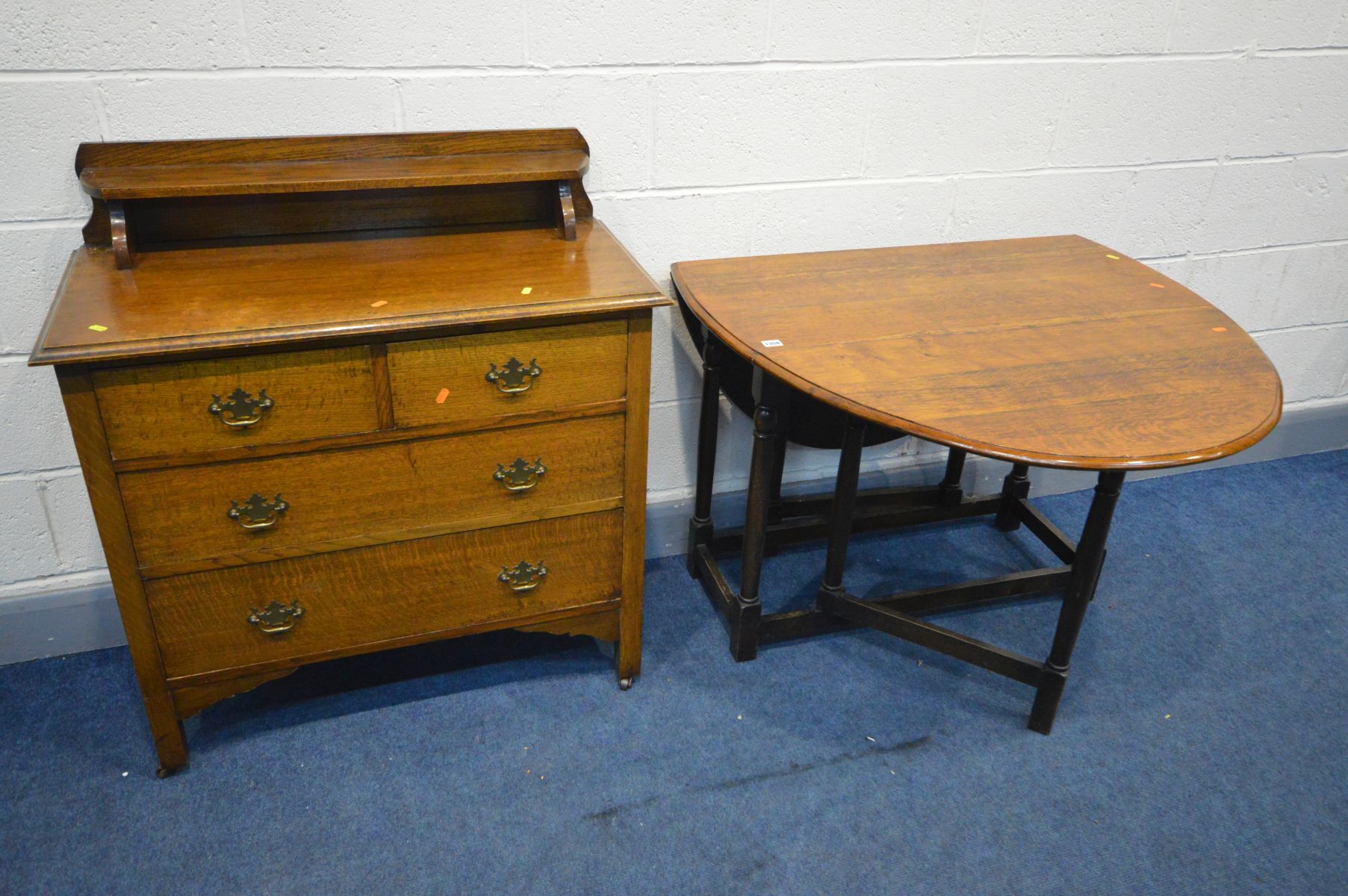 AN EARLY TO MID 20TH CENTURY SOLID OAK CHEST OF TWO SHORT OVER TWO LONG, with a raised shelf and
