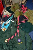 A BOX OF SCOUTING UNIFORMS AND ACCESSORIES, including three berets, five neckers, a shirt, fabric