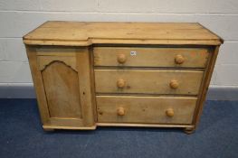 A VICTORIAN PINE SIDEBOARD, with three graduated drawers besides a single panelled cupboard door, on