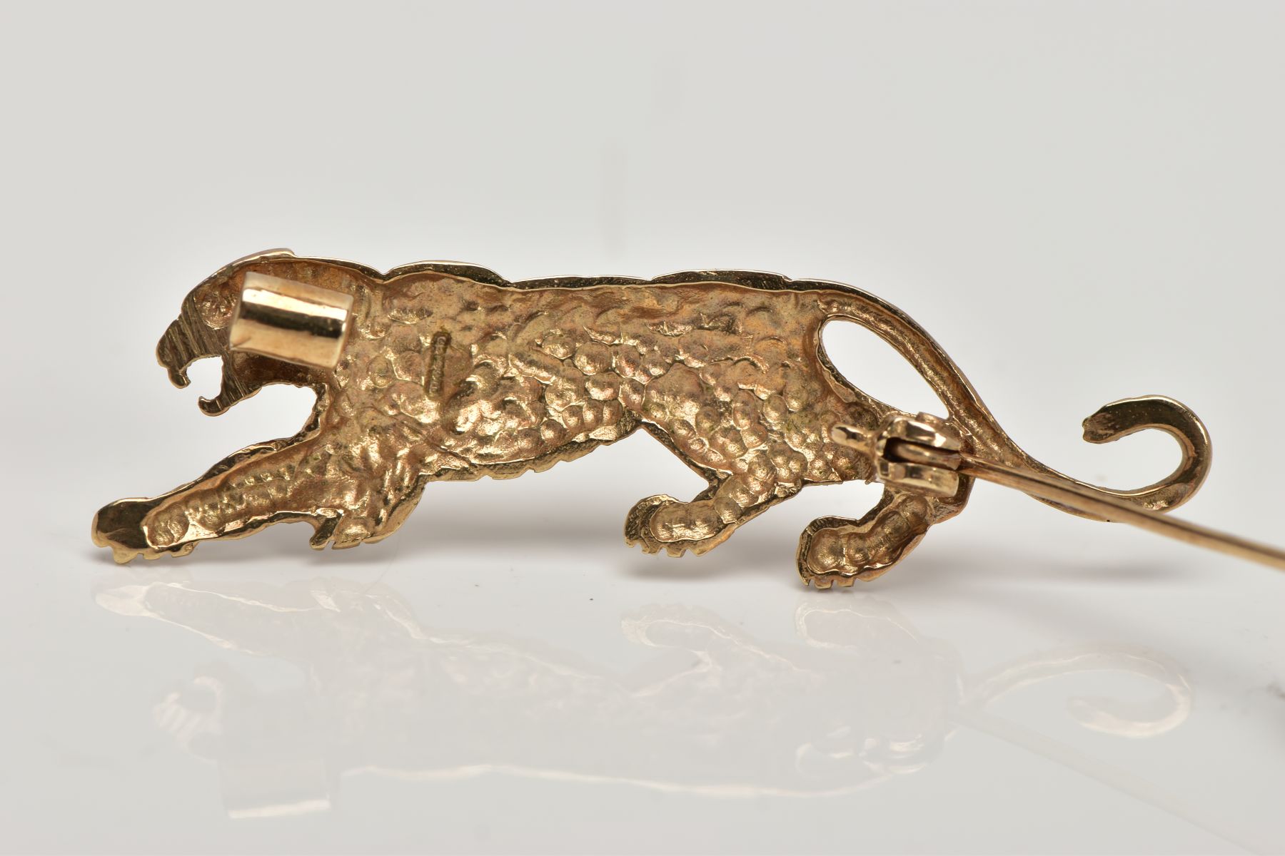 A 9CT GOLD BROOCH, in the form of a realistically stylised tiger, set with a circular cut ruby - Image 2 of 2