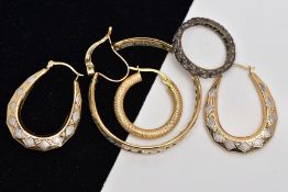 A PAIR OF YELLOW METAL HOOP EARRINGS, TWO SINGLE EARRINGS AND A RING, to include a pair of bi-colour