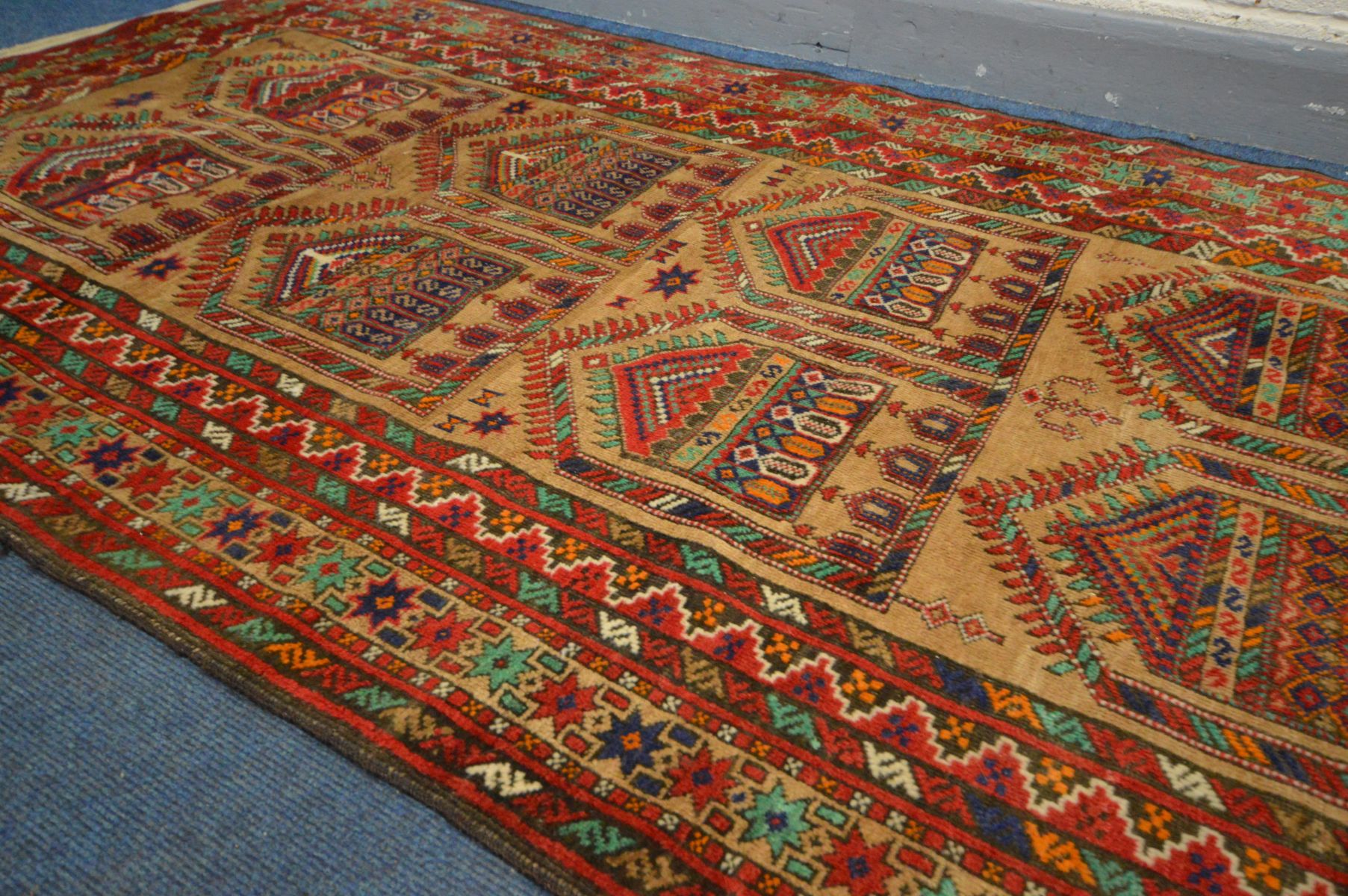 AN INDIAN RUG, russet and red field, and multistap border, 238cm x 128cm - Image 2 of 4