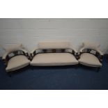 AN EDWARDIAN MAHOGANY THREE PIECE SALON SUITE, comprising a sofa, length 139cm and a pair of tub