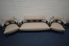 AN EDWARDIAN MAHOGANY THREE PIECE SALON SUITE, comprising a sofa, length 139cm and a pair of tub