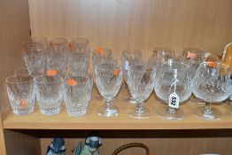 A SUITE OF WATERFORD CRYSTAL COLEEN PATTERN DRINKING GLASSES comprising six brandy, six wine, height