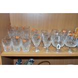 A SUITE OF WATERFORD CRYSTAL COLEEN PATTERN DRINKING GLASSES comprising six brandy, six wine, height