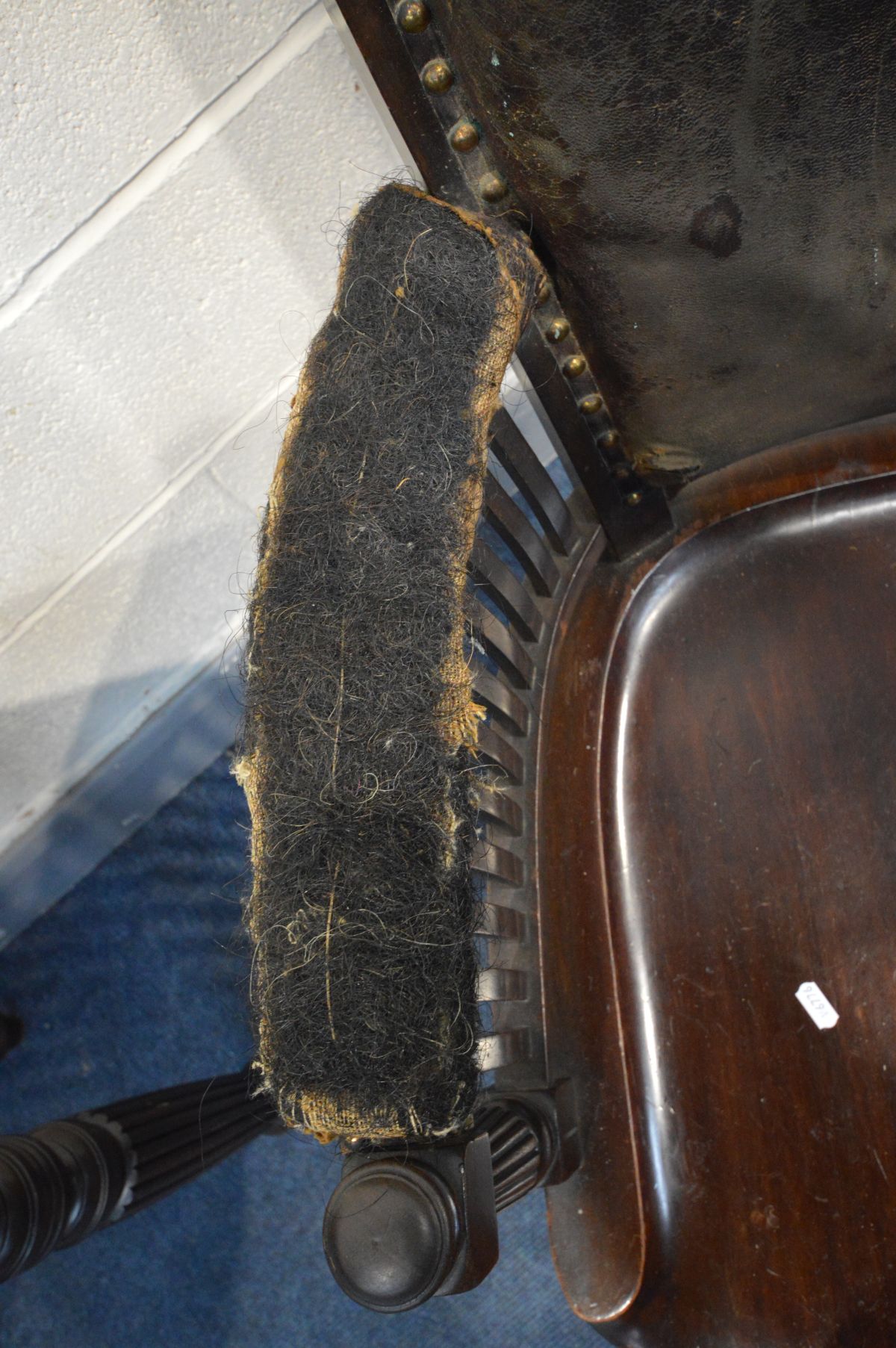 AN EARLY 20TH CENTURY MAHOGANY OFFICE ARMCHAIR, distressed leather, spindles armrests, dish seat, on - Image 3 of 7