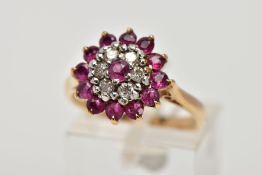 A 9CT GOLD RUBY AND DIAMOND CLUSTER RING, designed as a tiered cluster of circular cut rubies and