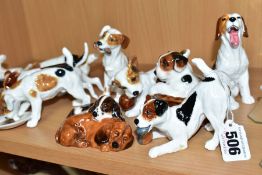 TWELVE ROYAL DOULTON CHARACTER DOGS, comprising HN2586, HN2587 (extensive cracks), HN2554, HN2590,