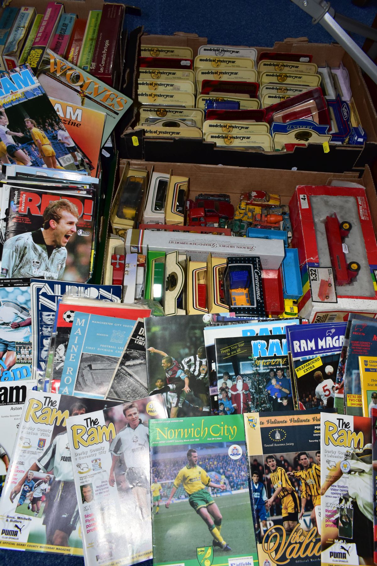FOUR BOXES AND LOOSE DIECAST MODELS, JIGSAWS & FOOTBALL PROGRAMMES, approximately 55 Diecast Models,