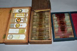 A COLLECTION OF APPROXIMATELY EIGHTY 19TH AND 20TH CENTURY PREPARED MICROSCOPE SLIDES, to include