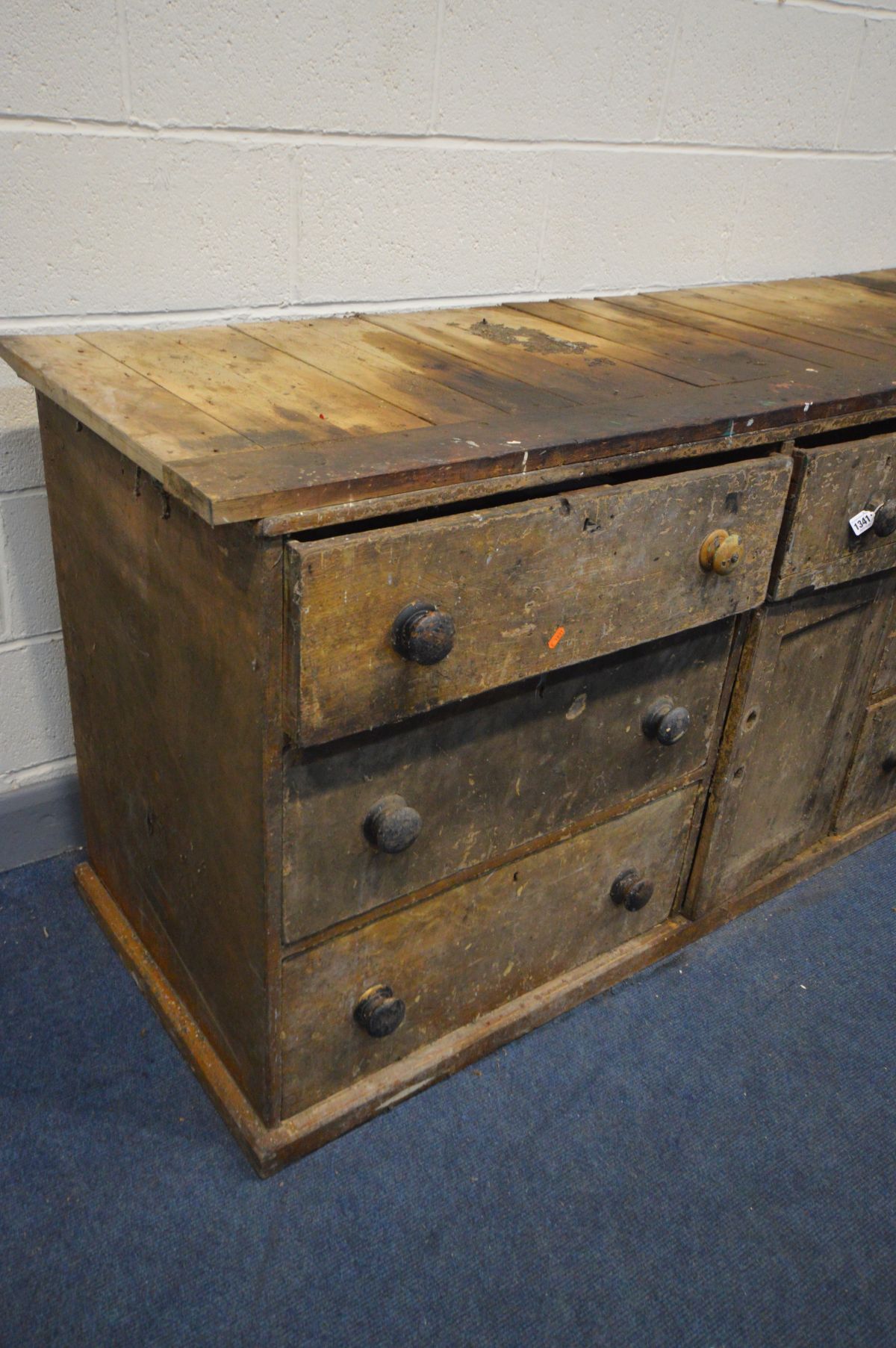 A 19TH CENTURY PINE SHOP COUNTER, made up of six assorted drawers, central panelled cupboard door, - Image 4 of 5