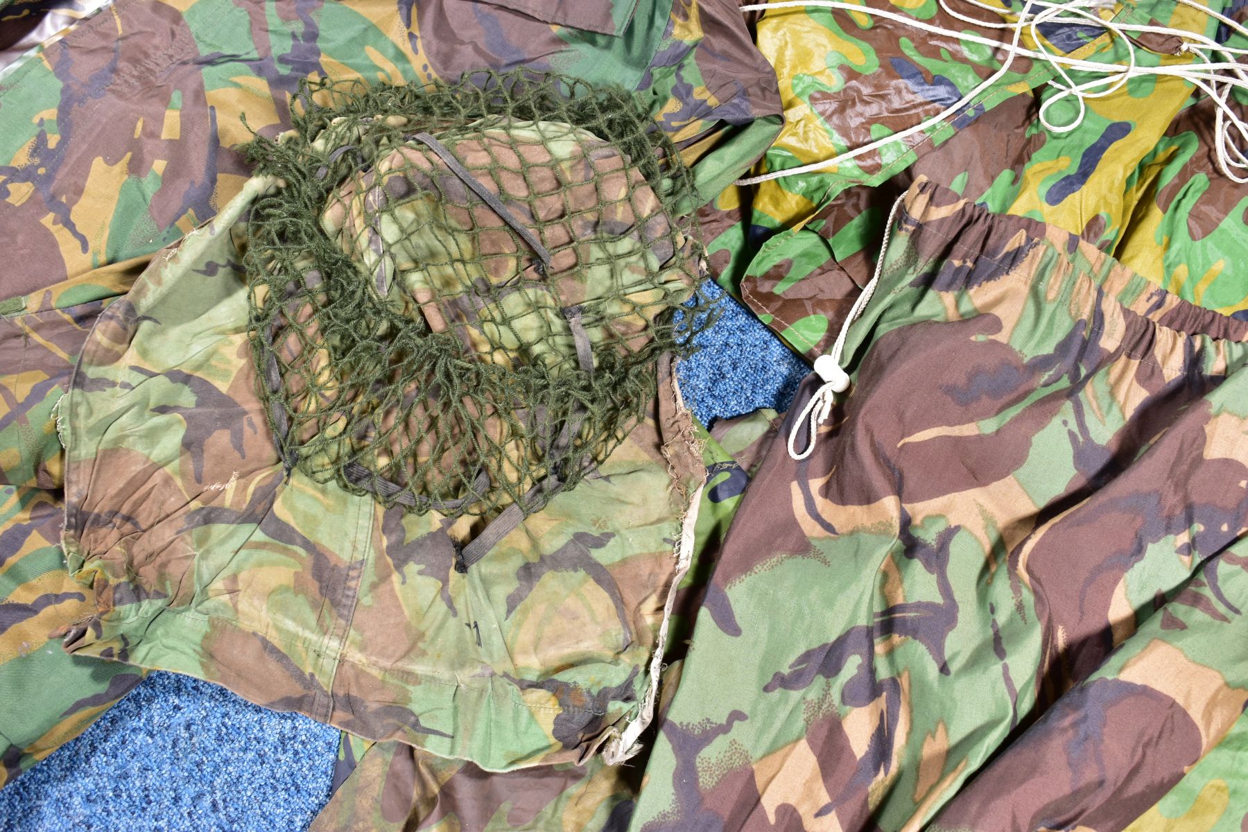 A BOX CONTAINING VARIOUS MILITARY CAMAFLOUGE ITEMS including shelter, poncho, over trousers, over - Image 2 of 6