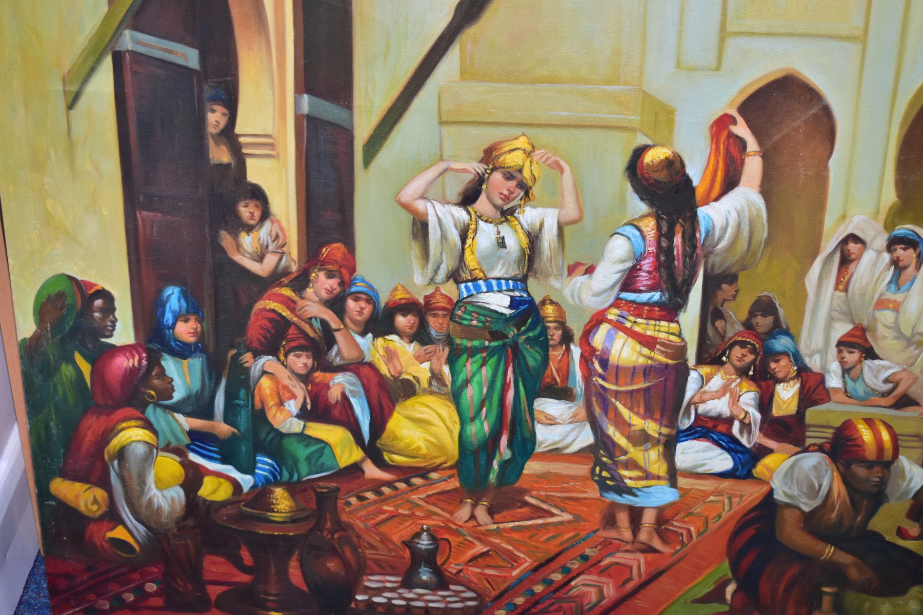 A LATE 20TH CENTURY MIDDLE EASTERN SCENE OF LADIES DANCING AND SPECTATORS IN A COURTYARD, OIL ON - Image 2 of 3