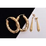 TWO PAIRS OF EARRINGS, the first a pair of elongated hoops with diagonal engine turned pattern,