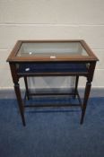 AN EDWARDIAN MAHOGANY AND INLAID BIJOUTERIE TABLE, rectangular form on square tapering legs united