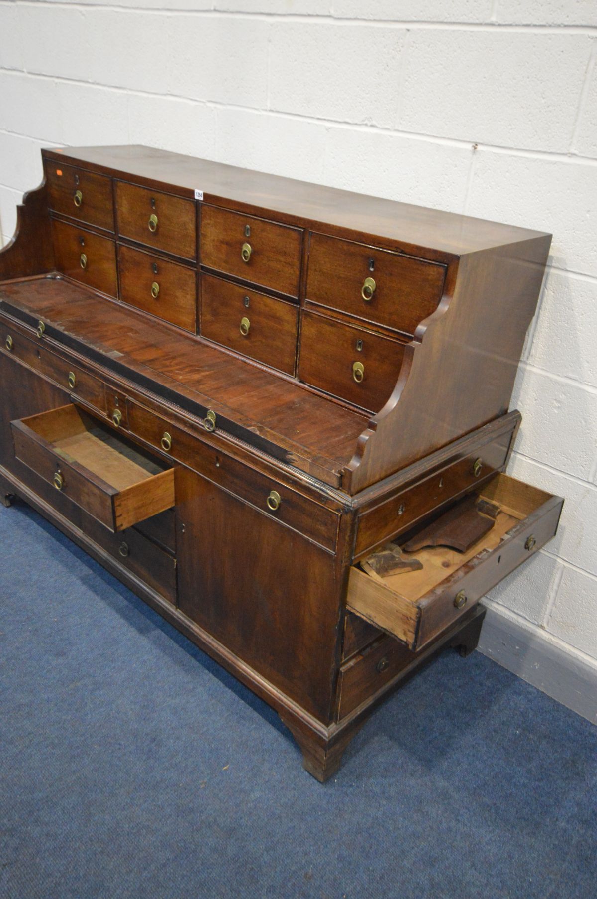 A GEORGIAN AND LATER MAHOGANY DESK, the top section with eight drawers and pull out writing slide, - Image 6 of 10