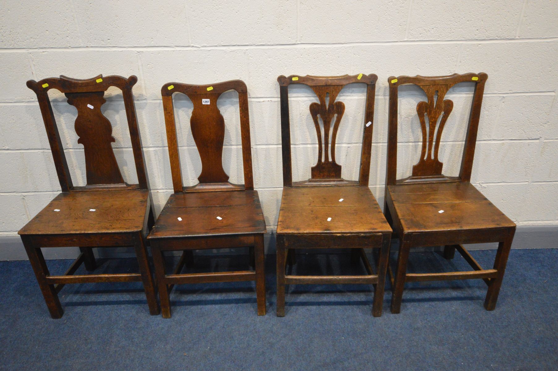 A HARLEQUIN SET OF FOUR 18TH CENTURY OAK WELSH SPLAT BACK CHAIRS (condition - historical crack to