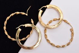 TWO PAIRS OF 9CT GOLD HOOP EARRINGS, the first of twist design, the second with engraved twist