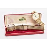 A GENTS 9CT GOLD 'ROAMER' WRISTWATCH, hand wound movement in need of some attention, round champagne
