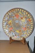 A CHARLOTTE RHEAD BURSLEY WARE CHARGER, in the 'Oranges and Lemons' TL5 pattern, printed and painted