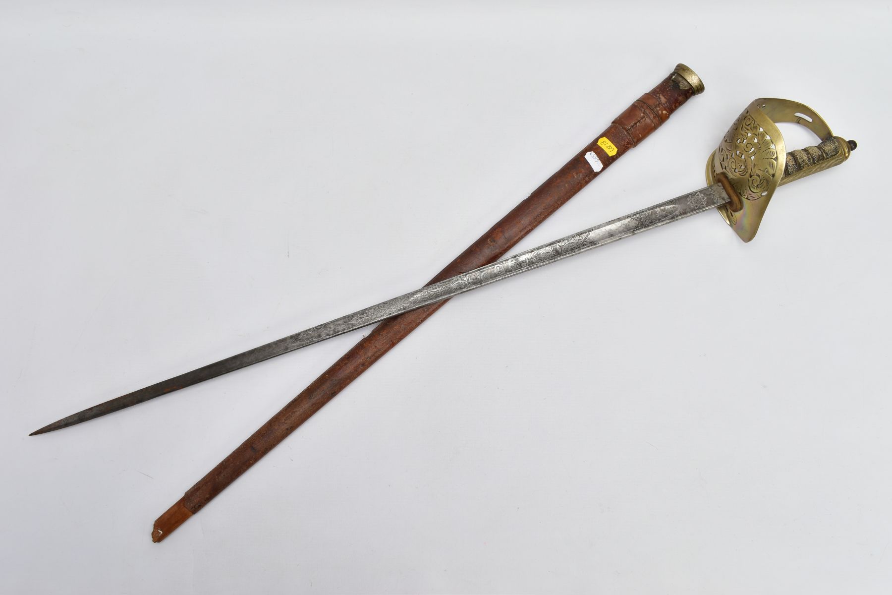 A FENTON BROTHERS LTD, SHEFFIELD 1897 PATTERN INFANTRY OFFICERS SWORD AND SCABBARD, the blade is