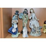 FIVE LLADRO FIGURES, comprising 5222 'Pretty Pickings', designed by Jose Puche, issued 1984, 4989 '