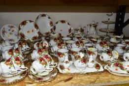 ONE HUNDRED AND FORTY THREE PIECES OF ROYAL ALBERT OLD COUNTRY ROSES TEA/DINNERWARES, comprising