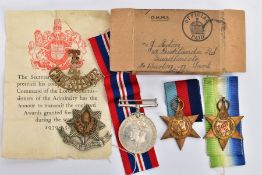 AN ORIGINAL WW2 BOX OF ISSUE (Naval) containing the 1939-45, Atlantic Stars & War medal, ribbons