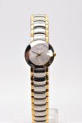 A LADIES BOXED 'RADO' WRISTWATCH, round silver dial signed 'RADO', spot markers, gold tone hands,