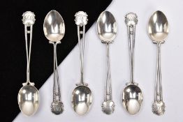 SIX SILVER TEASPOONS, each handle designed as two back to back golf clubs and golf ball with