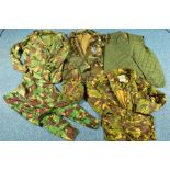 A NUMBER OF CAMOFLOUGE MILITARY UNIFORM ITEMS to includ, British Combat Smock liner size 4