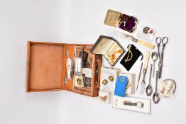 A JEWELLERY BOX WITH CONTENTS AND OTHER ITEMS the brown leather jewellery box with contents to