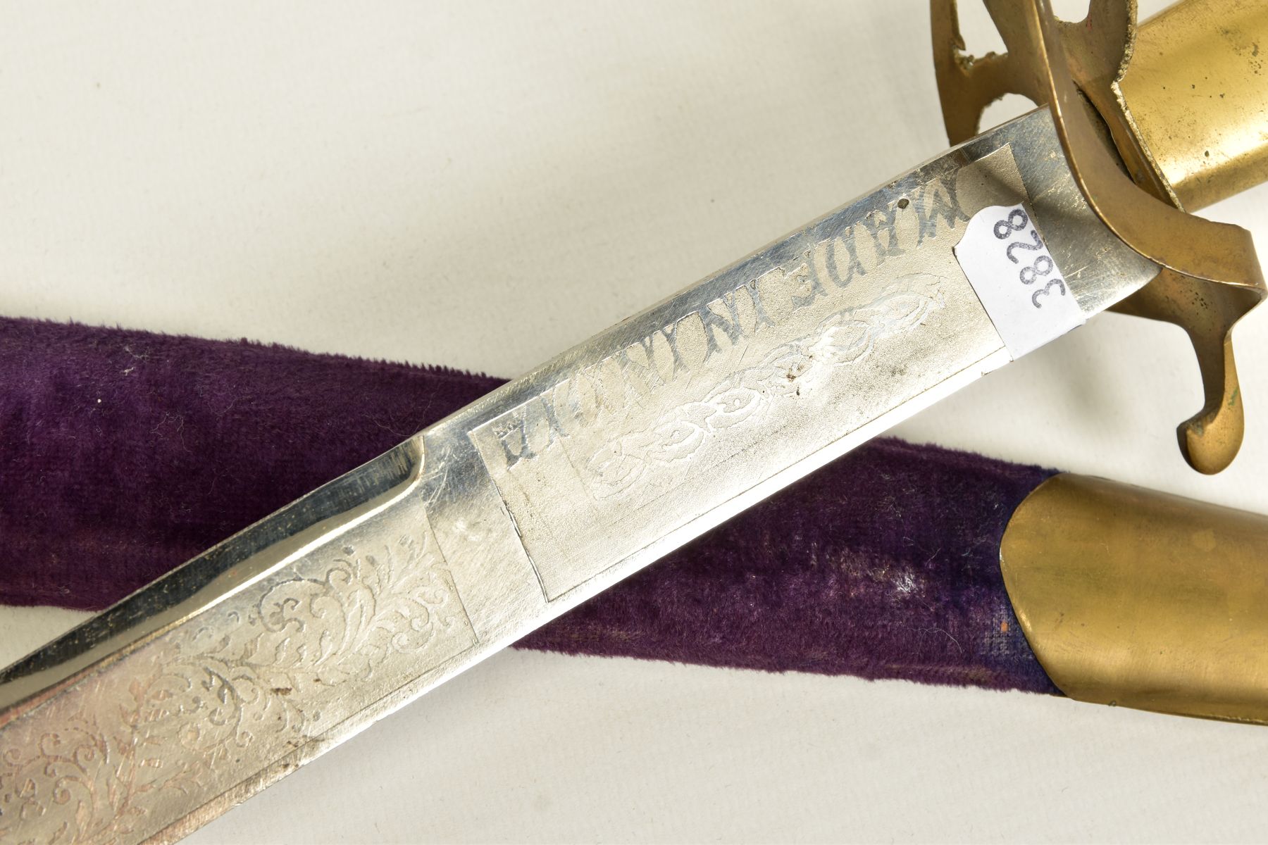 AN INDIAN MADE CURVED SWORD, in a wooden scabbard trimmed with purple coloured velvet style cloth - Image 10 of 12