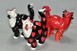 THREE LACOMBE WILLITTS DESIGNS 'WHIMSICLAY' CERAMIC CATS, comprising a black and white polka dot cat
