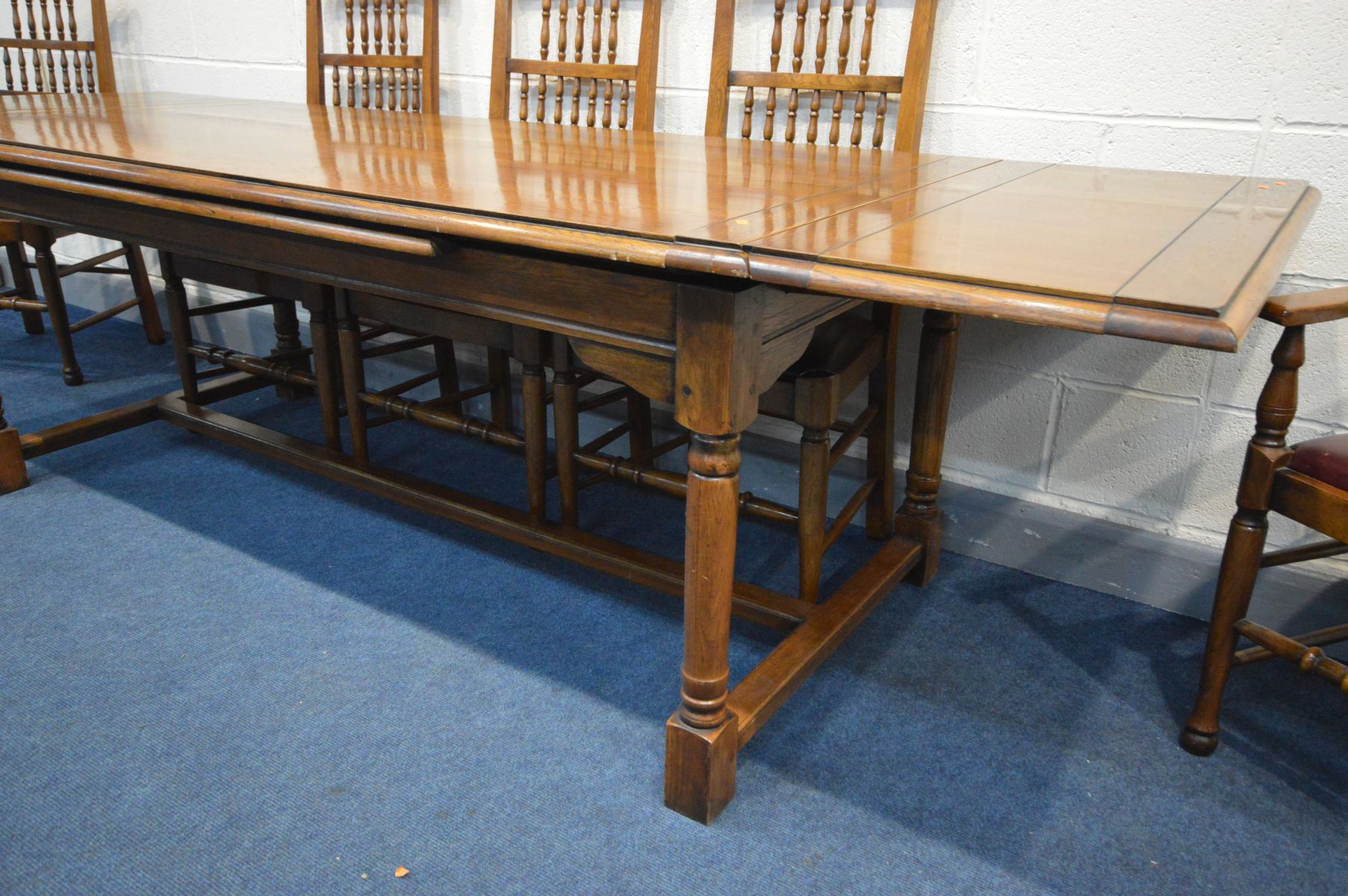 A GOOD REPRODUCTION OAK DRAW LEAF REFECTORY TABLE, on turned legs united by a single stretcher, - Image 5 of 6