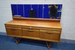 A MID 20TH CENTURY AFROMOSIA TEAK DRESSING TABLE, possible Elliotts of Newbury, with a rectangular