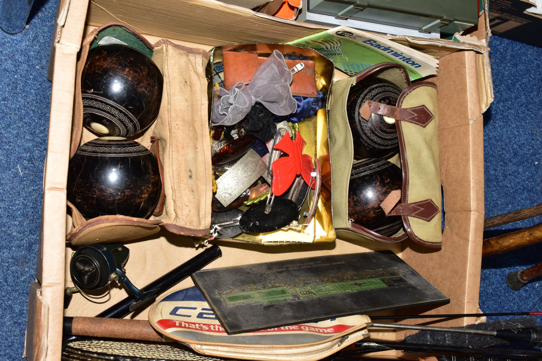 A BOX AND LOOSE OF SPORTING EQUIPMENT, WALKING STICKS, etc including three badminton rackets and '