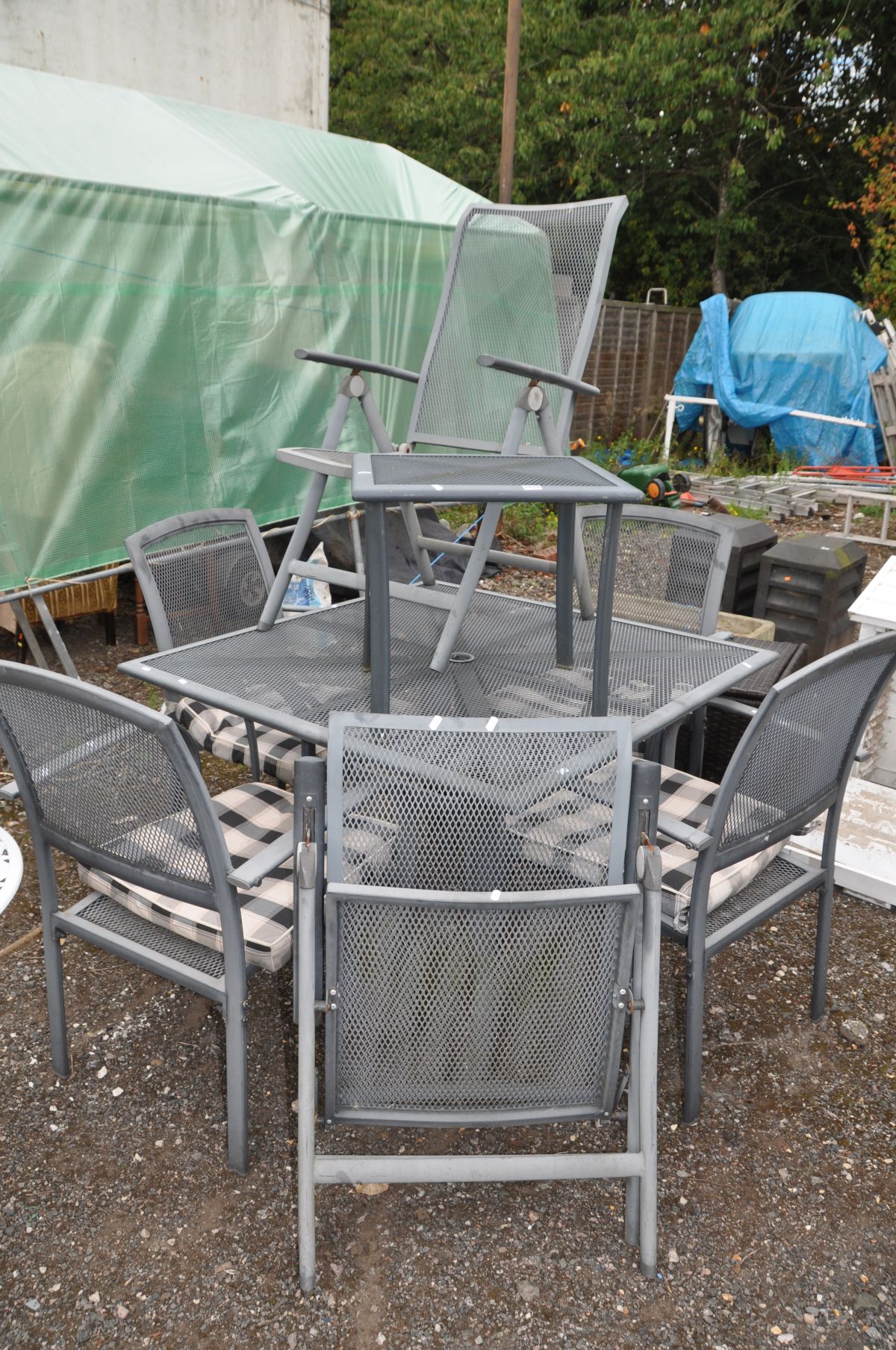 A MODERN METAL GARDEN TABLE, 110cm square top, four matching chairs, two matching folding chairs,