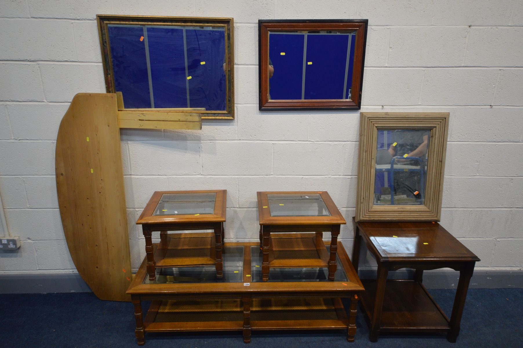 A CHERRYWOOD COFFEE TABLE with two glass inserts, and two matching occasional tables, along with